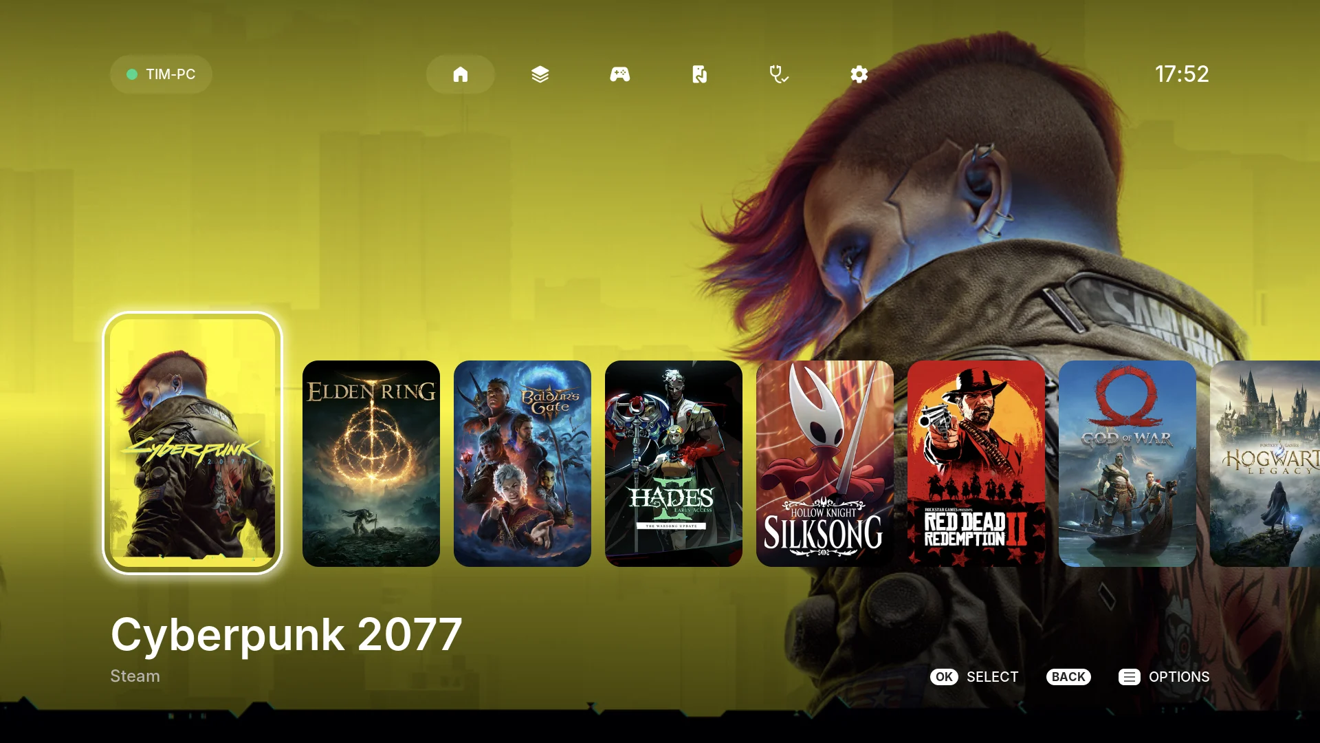 The CouchDeck Home screen on the webOS client: TIM-PC online at the top left, the navigation bar, a clock, Cyberpunk 2077's key art filling the screen, a row of covers with the focus ring on Cyberpunk 2077, and button hints at the bottom right.
