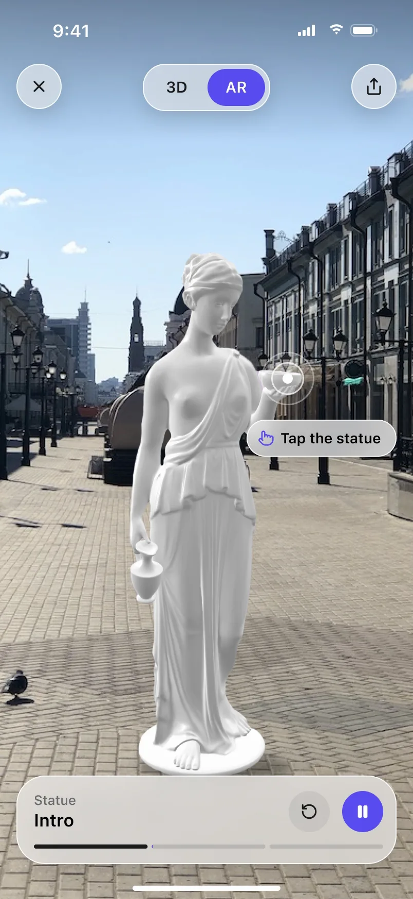 ARQ Viewer in AR: the statue in a real street, a pulse on its bowl and a Tap the statue hint; the tap switches the scene from Intro to Close-up and the statue jumps.